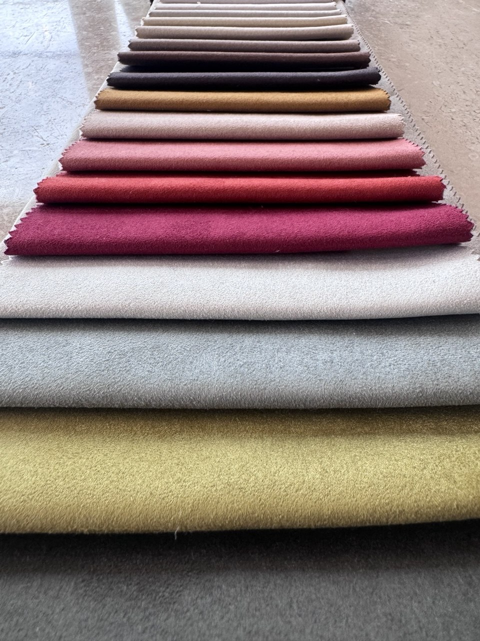 Close view of stitched edges on bespoke sofa fabric samples