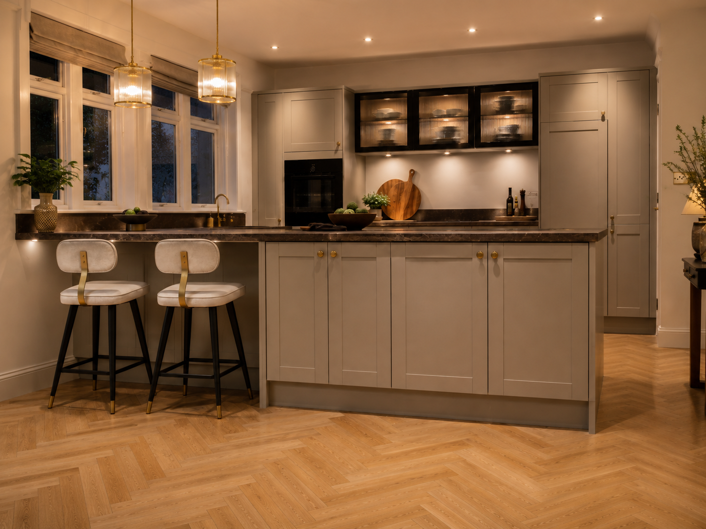 Warm putty shaker kitchen with island and pendant lighting