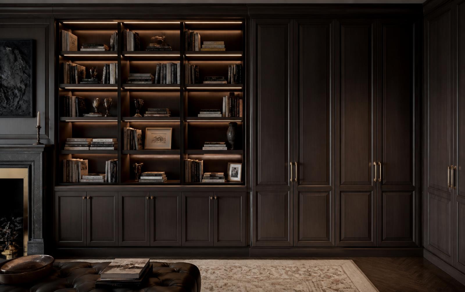Bespoke dark oak library shelving and fitted wardrobes by Dominus Design in a London home